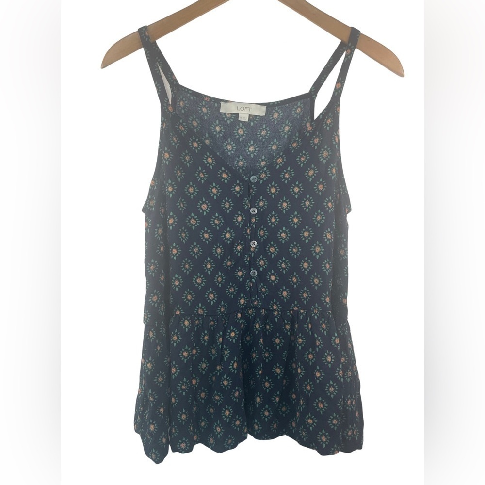 Loft navy tank top with a peplum hem. Super cute summer top. Women’s Medium.